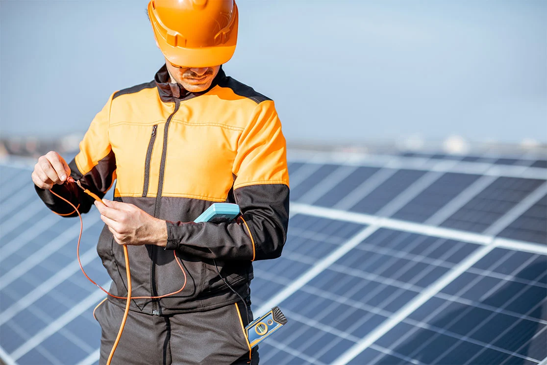 Electrician working on a solar station